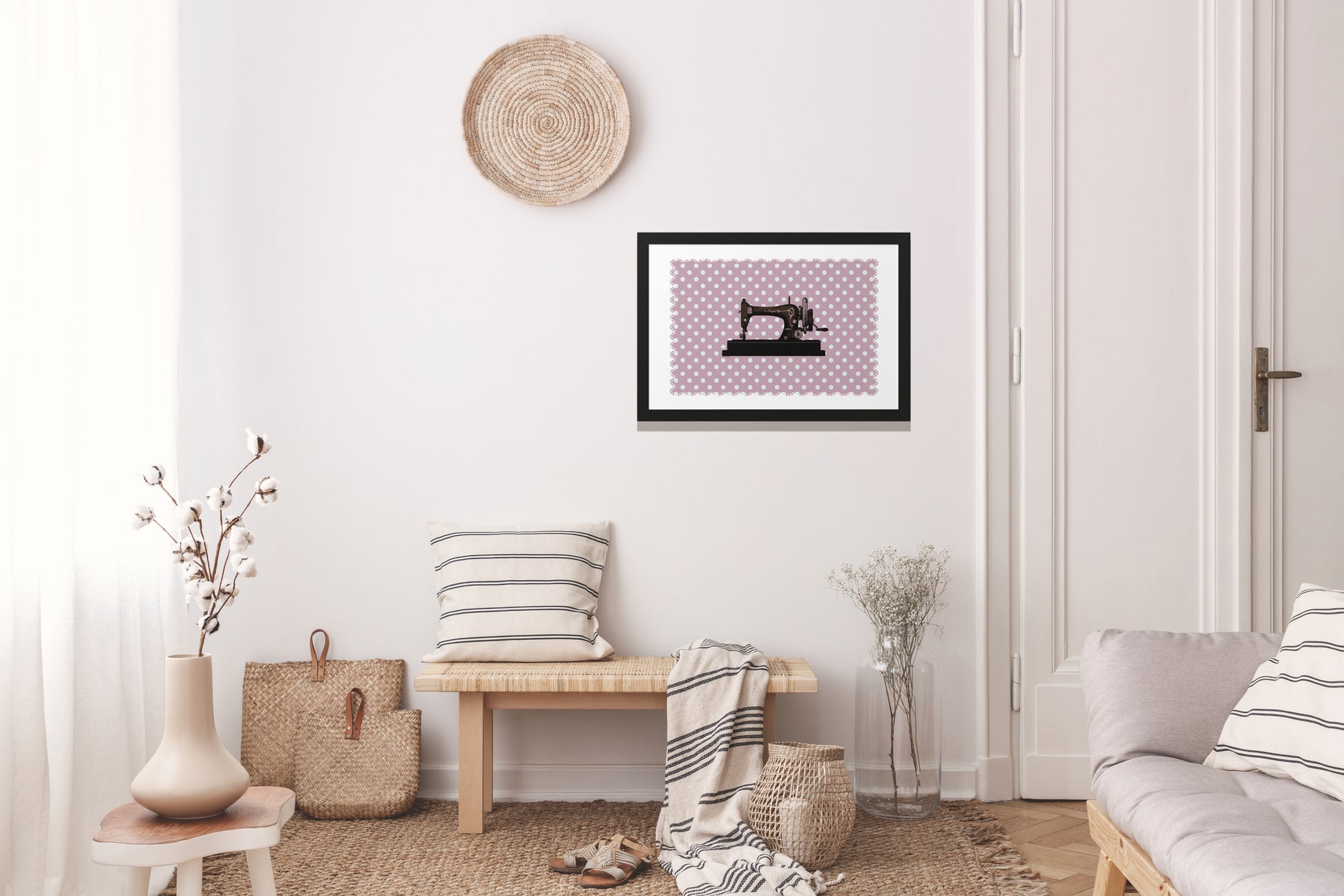 A picture of a sewing machine on an antique pink background with a black frame. Suitable for retro and vintage lovers. Suitable for a room with a white rustic design