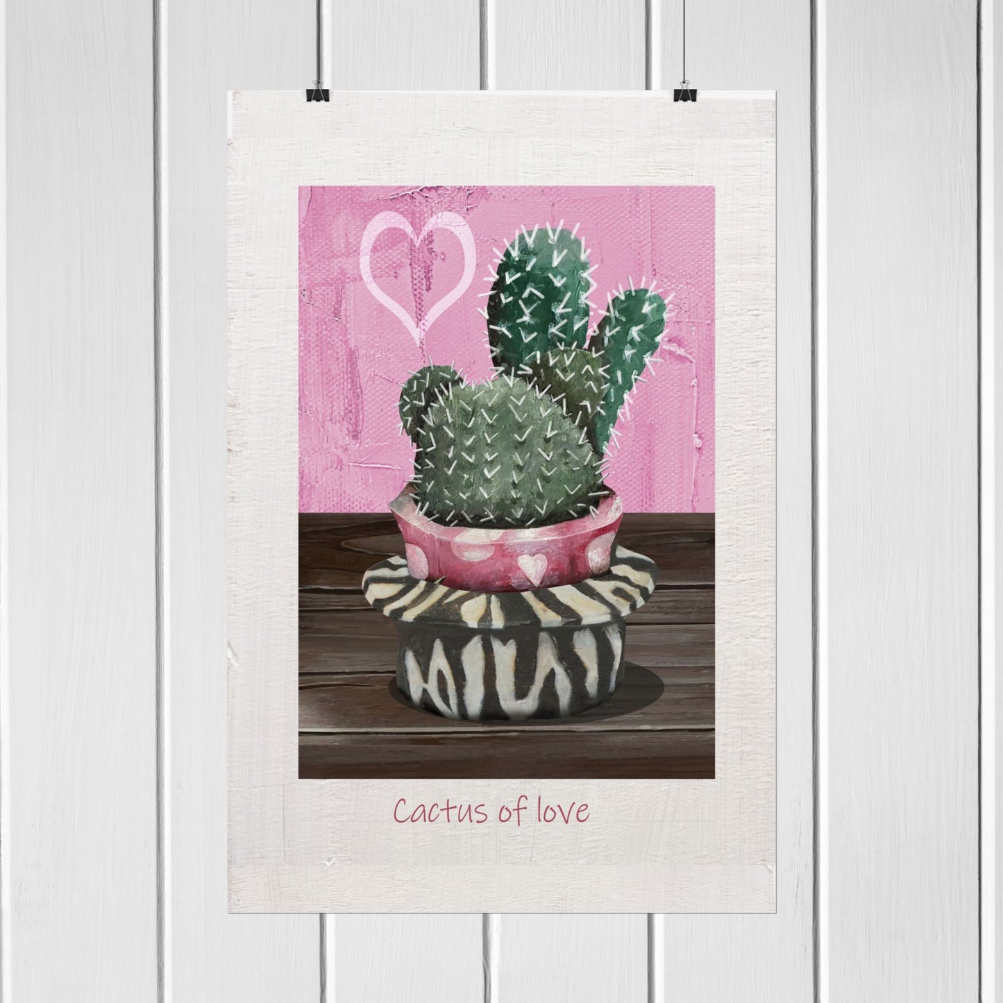 Transform your space with this stunning vertical poster featuring a realistic oil painting and graphic design of cacti in a pink vessel adorned with white dots and a heart. Perfect for plant lovers and those who appreciate unique and artistic home decor, this vibrant artwork adds a pop of color and a touch of nature-inspired beauty to any room. Ideal for zebra texture lovers, this poster is a delightful blend of modern design and natural elements, making it a perfect addition to your wall art collection.