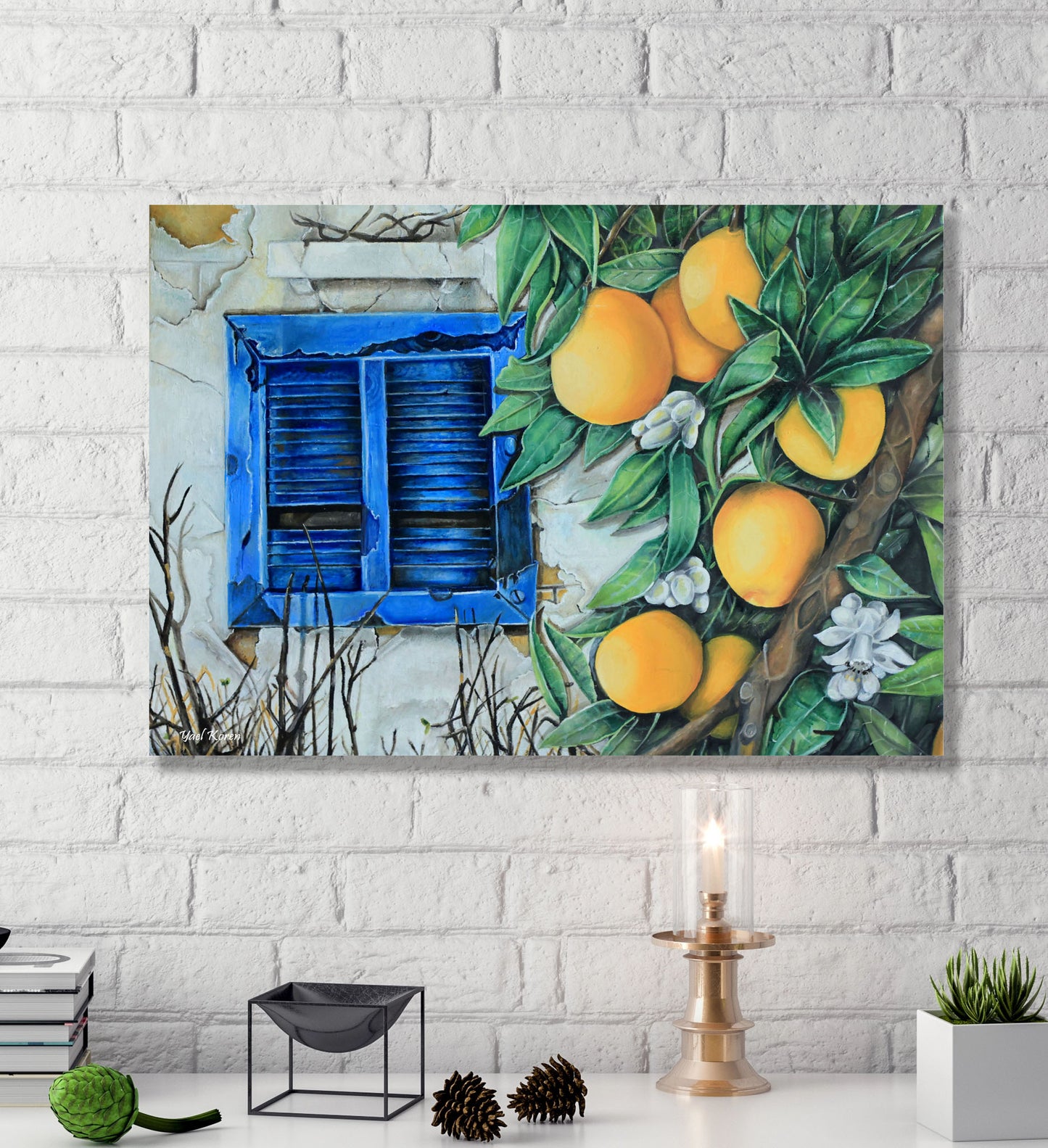 The poster of the blossoming orange branch, in the background of the old house, also fits perfectly on a white brick wall. Adds a romantic atmosphere to any room