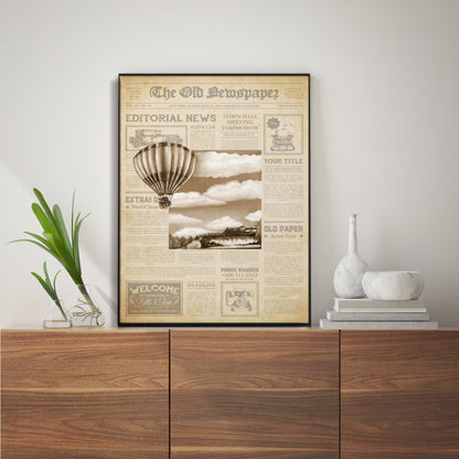 An old newsprint poster with an oil painting in the center of a black and white landscape image from which a hot air balloon emerges. The picture can fit into any room and looks great on a luxurious brown sideboard with white pitchers next to it