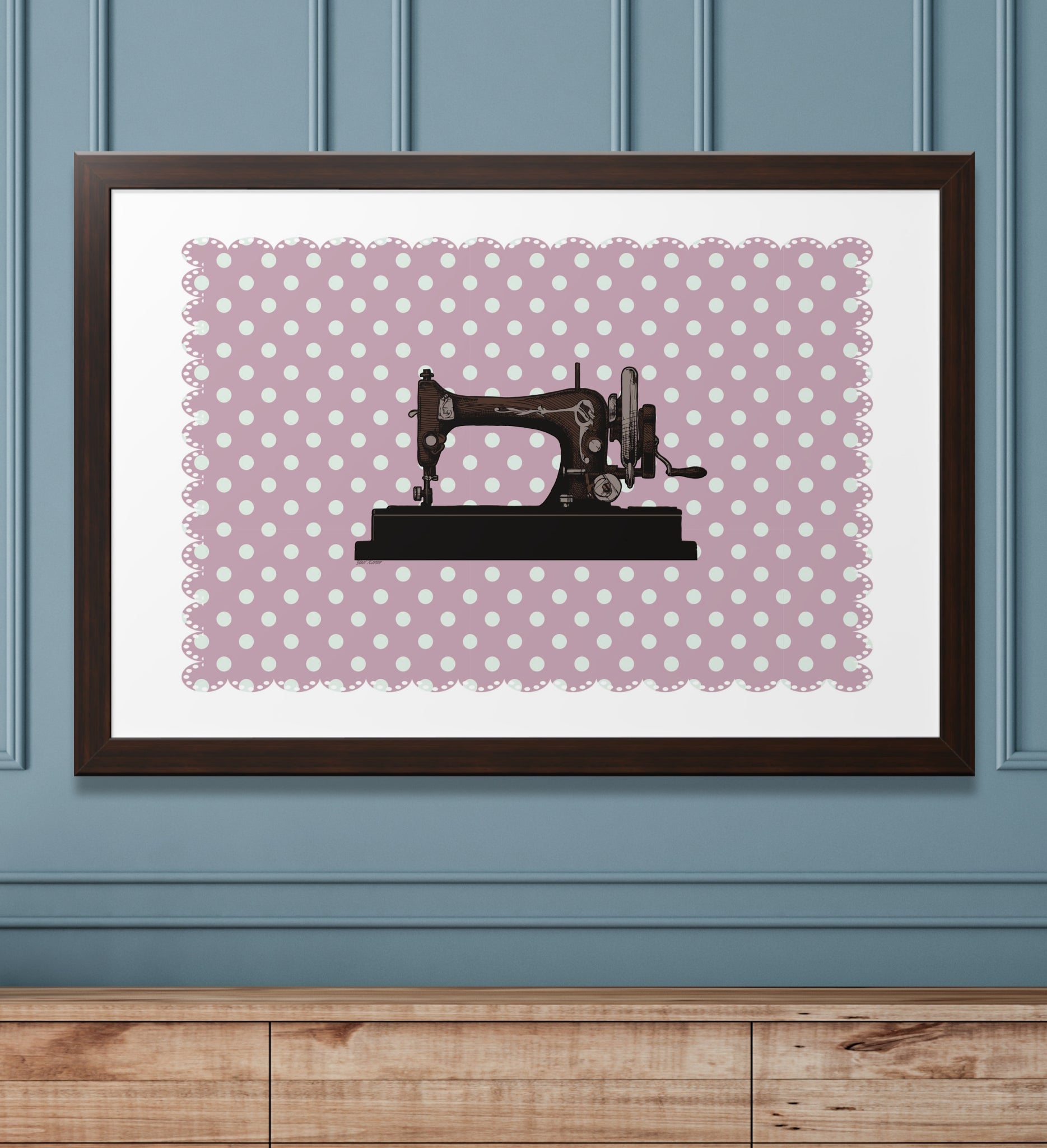 A framed picture of a sewing machine on an antique pink background. Vintage style. A picture that will add nostalgia to any room