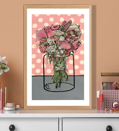 An amazing drawing of a bouquet of flowers tied with a silk ribbon placed on a pink gift paper with dots, with a jar illustrated on the paper. The painting is suitable for a girl who likes the vintage style